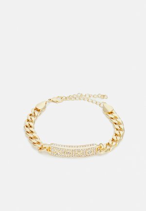 Kullatud käevõru, millel on tükiline ahelakujundus ja ristkülikukujuline keskus, kaunistatud selgete rhinestone'idega, tekstuuriga pinnaga ja reguleeritava klambriga.