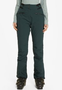 Pantalones de esquí verde oscuro con una cintura alta, bolsillos con cremallera en la parte delantera y una textura lisa y suave. Incluye tirantes ajustables para un ajuste seguro.