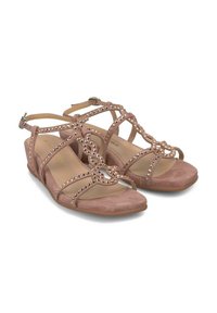 Sandali in suede rosa chiaro con fasce decorativi in perline e tacco a zeppa basso. Presentano una cinghia alla caviglia regolabile per una migliore vestibilità.