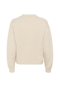 Pull uni beige raccourci avec un ourlet et des poignets côtelés, confectionné dans un matériau doux et texturé. Il présente un col rond et des épaules tombantes.