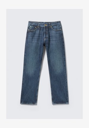Mørkeblå denimjeans med design i lige ben, fem lommer og kontrasterende gul syning. Let falmede områder tilføjer tekstur.