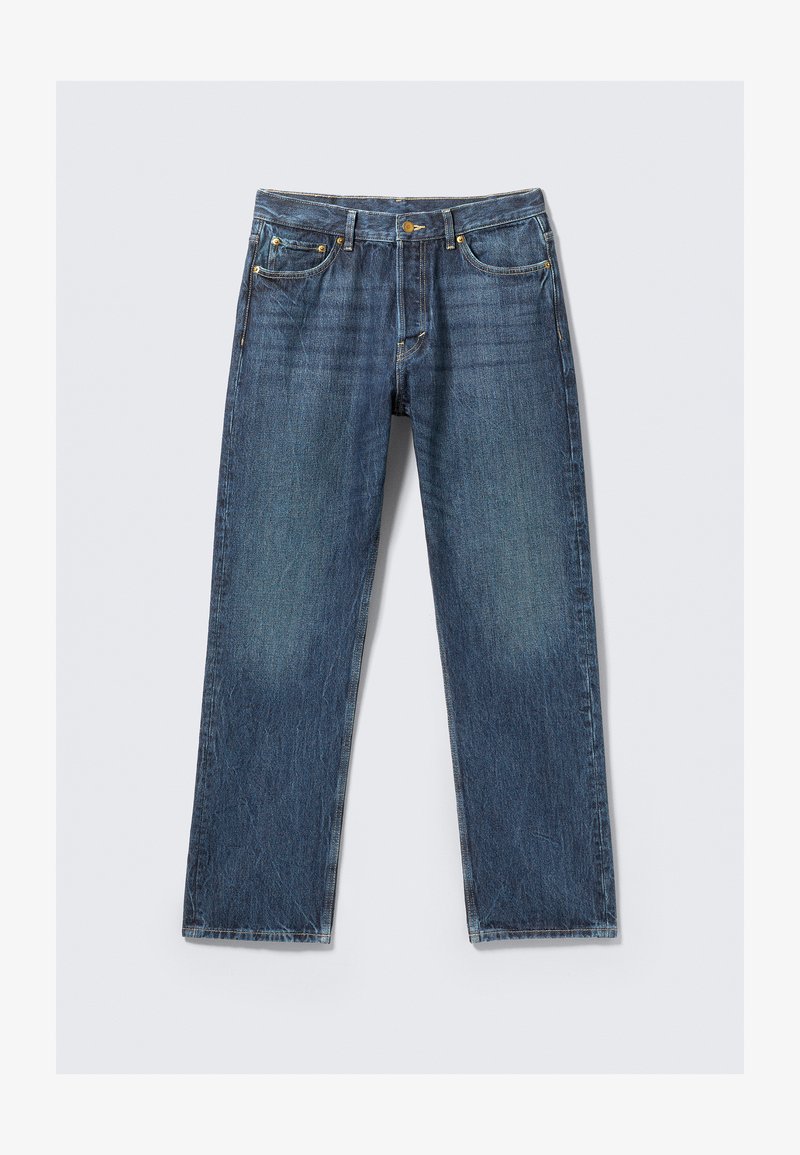 Tmavě modré džíny z denimu s rovnými nohavicemi, pěti kapsami a kontrastním žlutým stehem. Lehce vybledlé oblasti dodávají texturu.