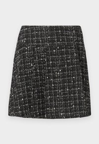 Black and white tweed skirt with a textured pattern, straight cut, and a subtle grid design. Features a waistband and no visible fasteners.