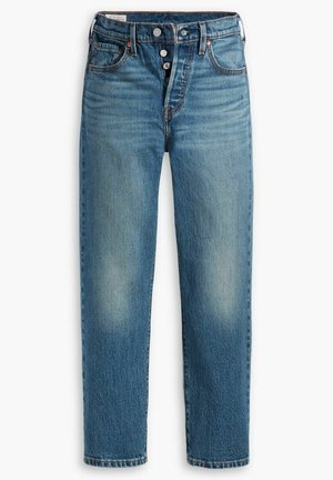 Jeans in denim blu chiaro con vestibilità dritta, design a cinque tasche e chiusura a bottone. Leggera sfumatura e vistosità delicata sul davanti.