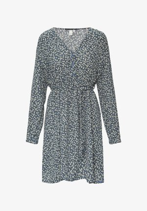 Tamsiai mėlynas gėlių dresą su ilgomis rankovėmis. Yra V formos iškirptė, mygtukų užsegimas ir elastinga juosmens juosta su rišama juosta. Mažas baltų gėlių raštas.