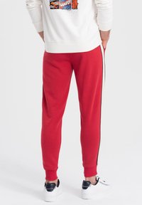 Ombre Jogginghose - red