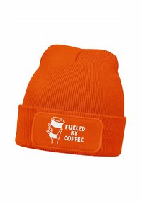 Orange knit beanie cap featuring a textured design with a rectangular patch displaying the text "FUeLED BY COFFEE" and a coffee cup graphic.