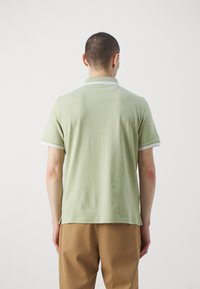 Michael Kors GREENWICH - Polokošeľa - light sage heater