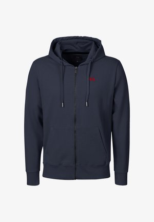 Laivastonsininen vetoketjullinen huppari, jossa on etutaskut, kiristysnauhakapussi ja pieni punainen logo vasemmassa rinnassa.