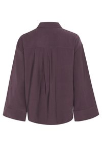 Purple oversized shirt with a collar, long sleeves, back pleat detail, and smooth texture. Tailored fit with cuffs at sleeve ends.