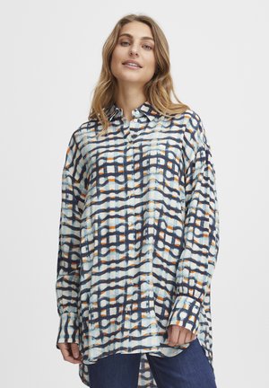 Button-up shirt featuring a blue, white, and orange grid pattern. Long sleeves, relaxed fit, and curved hem. Lightweight fabric and textured surface.