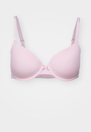Reggiseno imbottito rosa chiaro con tessuto liscio, supporto con ferretto, spalline regolabili e un piccolo fiocco al centro.