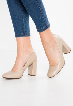 Højhælede pumps - beige