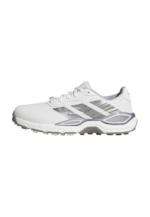 Weißer Sportschuh mit silbernen Streifen, Schnürverschluss, gepolsterter Sohle und strukturiertem Außensohle für besseren Halt, von der Seite gezeigt.
