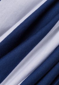 Cotton fabric featuring blue and white horizontal stripes. Soft texture with a smooth finish, highlighting contrasting color bands.