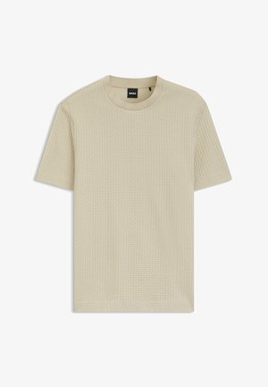 Beige short-sleeve crew neck t-shirt with subtle textured pattern and black "BOSS" label at the neckline.