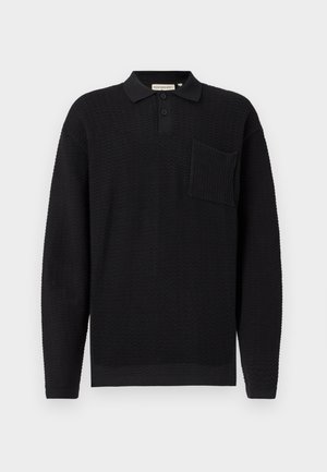Black long-sleeve polo shirt in textured fabric, featuring a collar, three buttons, and a patch pocket on the left chest.