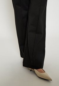 Minus MSMARCIA WIDE LEG  - Auduma bikses - black