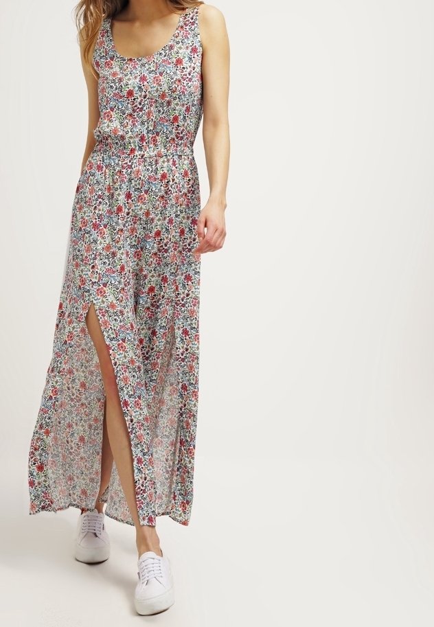 Maxi šaty s květinovým vzorem, s přiléhavým živůtkem, elastickým pasem a vysokým rozparkem na stehno. Vyrobené z lehké látky s vícebarevným květinovým motivem.