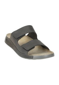 Black slide sandal with two adjustable Velcro straps. Soft inner lining, curved footbed, and durable rubber sole with a textured edge.