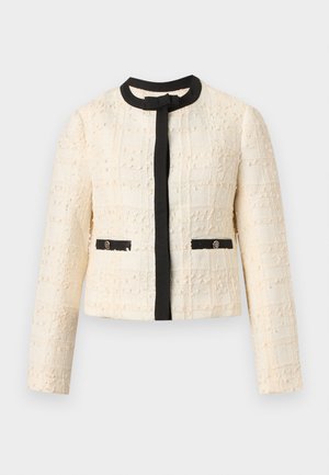 Elevandiluust tekstuuriga pika varrukaga jakk, millel on must ääris krae, eesääre ja taskuklapid ning ees taskutel kaks nuppu.