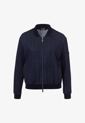 Marineblauer Bomberjacke mit vertikalen Nadelstreifen, gerippten Bündchen und Saum, Reißverschluss vorne und Seitentaschen. Hergestellt aus strukturiertem Denimstoff.