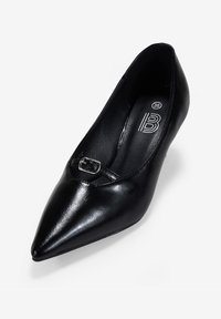 Décolleté nera in pelle con punta affusolata, dotata di una piccola fibbia come dettaglio, texture liscia e silhouette elegante. Taglia etichettata 36.