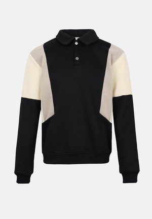 Pullover a maniche lunghe con design a blocchi di colore nero, beige e crema, con colletto e due bottoni a pressione argentati al collo.