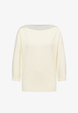 Lange mouw crèmekleurige top met een bootnek en zilveren glitterafwerking langs de schouders en mouwen, omgeslagen manchetten.