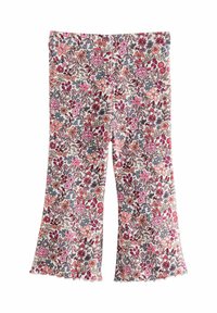 Uitlopende bloemenleggings van lichte stof, met een meerkleurig patroon van roze, rode en blauwe bloemen op een crème achtergrond, met een golvende zoom.