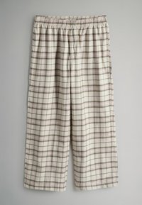 Raibsvītroti beigtie šorti ar elastīgu jostu, kas rotāti ar plānām brūnām un rozā līnijām kvadrātveida rakstā. Mīksts audums ar brīvu piegriezumu.