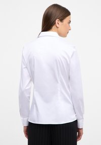 Alma Satin Mini Dress in White | Altar'D State