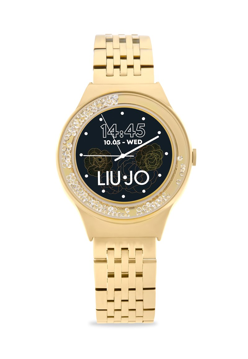 Orologio da polso in tonalità dorata con quadrante nero, design floreale e accenti di cristallo. Presenta un cinturino a maglie e un display digitale. Marca: LIU JO.