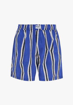 Blauwe zwemshorts met verticale golvende witte en zwarte strepen, elastische tailleband en WRSTBHVR merklabel aan de voorkant in het midden.