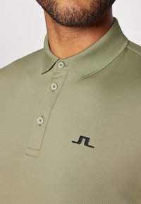 J.LINDEBERG Sports BRIDGE - Polo marškinėliai - oil green