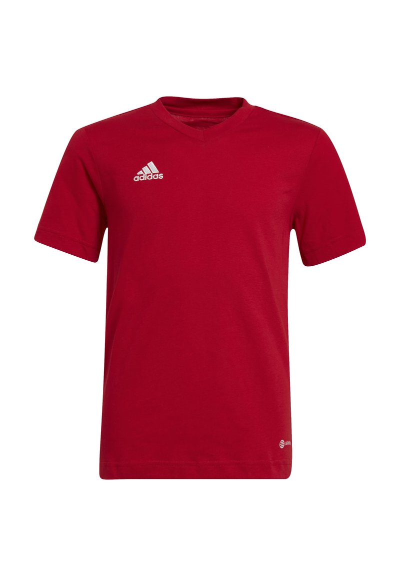 T-shirt rosso a maniche corte in cotone, con scollo a V e logo Adidas bianco sul lato sinistro del petto, caratterizzato da una texture liscia.