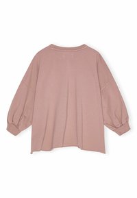 Tolmukollane roosa, üli-suure suurusega pullover, mis on valmistatud pehmest kangast, millel on puhv-pleed ja ümar kaelus koos väikese kõrge ja madala helmiga.