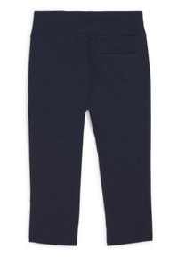 Leggings blu navy con una ampia vita, tessuto elastico e una piccola tasca posteriore. Texture liscia senza motivi visibili o dettagli hardware.