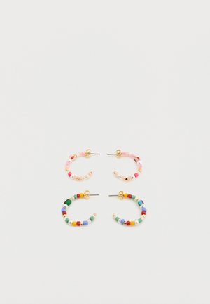 Colorful hoop earrings made of beads in pink, green, and various colors, featuring gold-tone metal hardware and a curved shape.