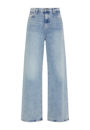 Jeansy z wysokim stanem i szerokimi nogawkami w jasnoniebieskim deniminie. Posiadają pięć kieszeni, zapięcie na guzik oraz gładką, lekko wyblakłą fakturę.