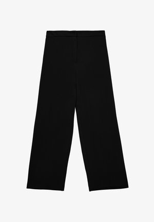 Pantaloni neri a gamba larga con vita alta e dettagli minimali, stesi su uno sfondo bianco.