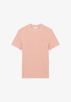 Zachtroze T-shirt met korte mouwen, witte bies rond de ronde hals en een klein bijpassend roze geborduurd logo op de linkerborst.
