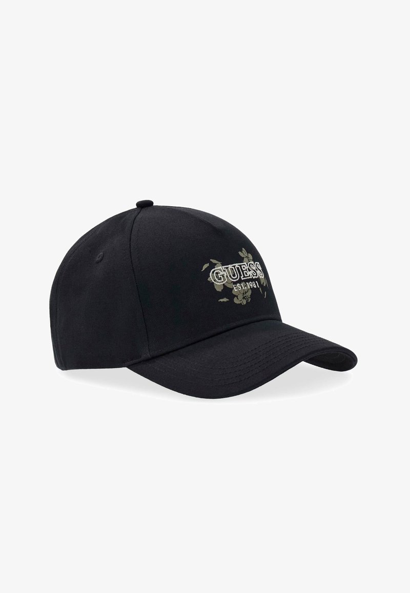 Casquette de baseball noire avec visière incurvée comportant le texte ""GUESS EST. 1981"" et un motif floral brodé sur le panneau avant.
