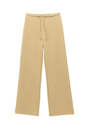 Pantalones de pierna ancha beige con cinturilla elástica y cordón, fabricados en una tela suave, exhibidos de forma plana sobre un fondo blanco.