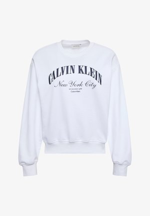 Balta garām piedurknēm džemperis ar uzrakstu "CALVIN KLEIN New York City Established 1968" melnā krāsā uz krūtīm.