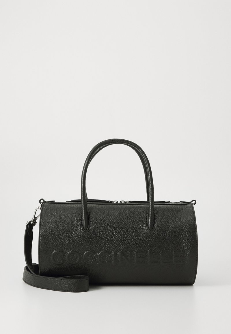 Black textured leather handbag with two top handles, a detachable shoulder strap, and embossed "Coccinelle" logo on the front.
