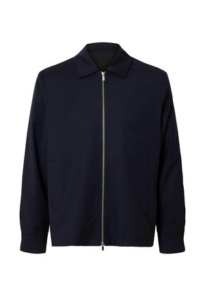 Jachetă bărbătească bleumarin cu fermoar argintiu complet, guler ascuțit, mâneci lungi și două buzunare laterale pe un fundal alb.