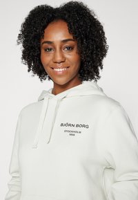 Björn Borg ESSENTIAL HOODIE - Mikina s kapucňou - zephyr blue