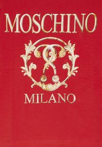 Red cotton t-shirt featuring gold and white ornamental graphic with "MOSCHINO" and "MILANO" text. Soft texture, short sleeves, crew neckline.
