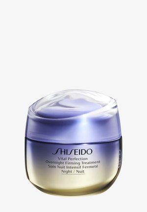 Shiseido Vital Perfection Overnight Firming Treatment cremekrukke med gradient fra lilla til guld og klart, blankt låg.